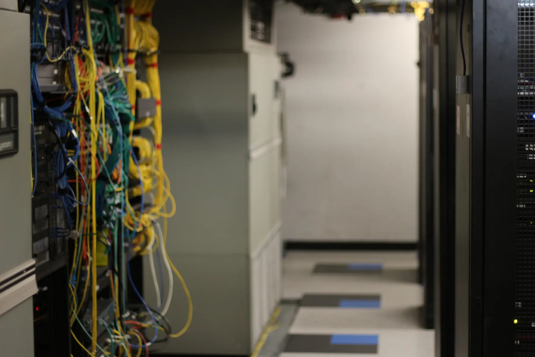 Fiber and network cabling beside server cabinets in the Los Angeles data center